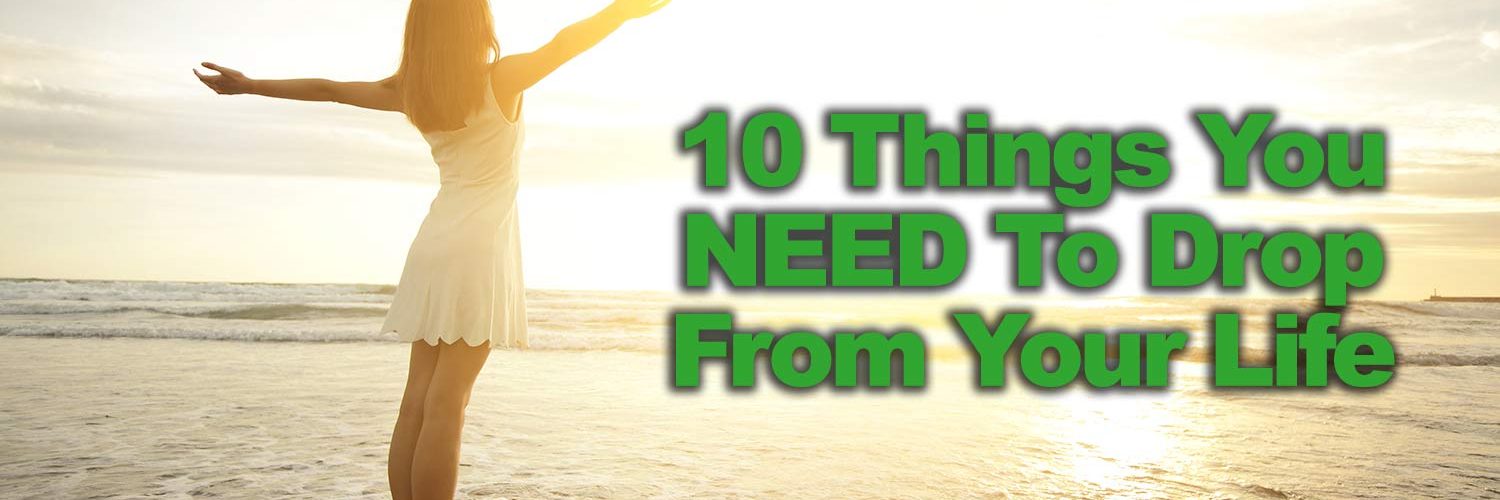 10 things to drop woman standing on a beach with arms raised